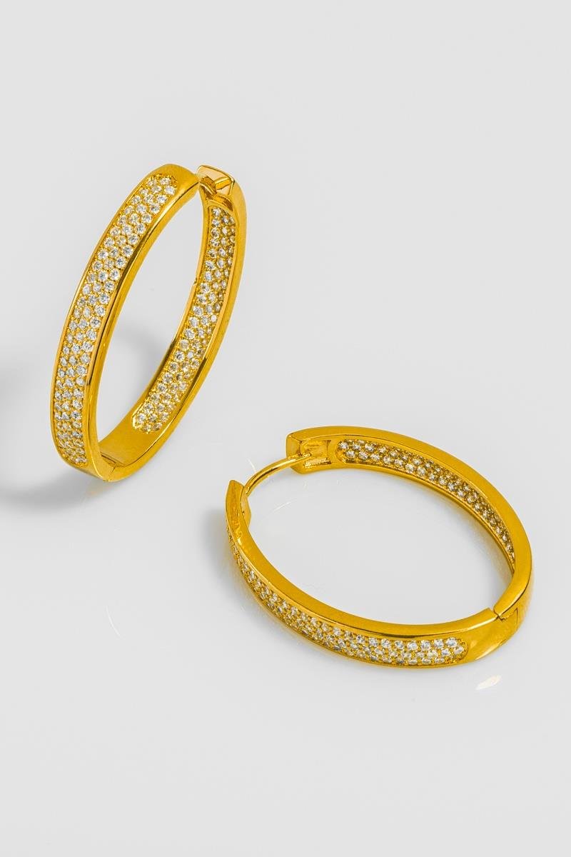 BRINCO OVAL CRAVEJADO EM ZIRCÔNIAS INTERNO E EXTERNO 36X28MM OURO