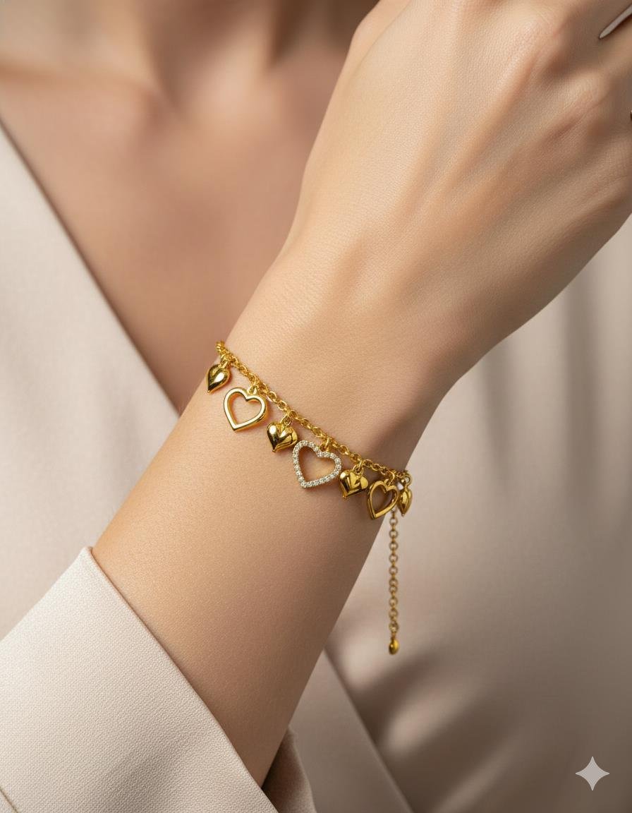 PULSEIRA CORAÇÕES CRAVEJADO EM ZIRCÔNIAS VAZADO LISO ELO PORTUGUÊS OURO