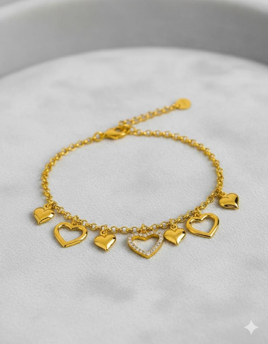 PULSEIRA CORAÇÕES CRAVEJADO EM ZIRCÔNIAS VAZADO LISO ELO PORTUGUÊS OURO