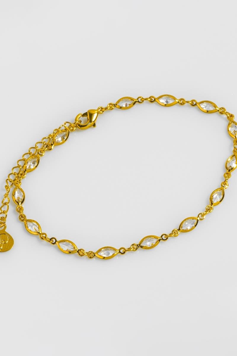 PULSEIRA ZIRCÔNIAS NAVETE OURO