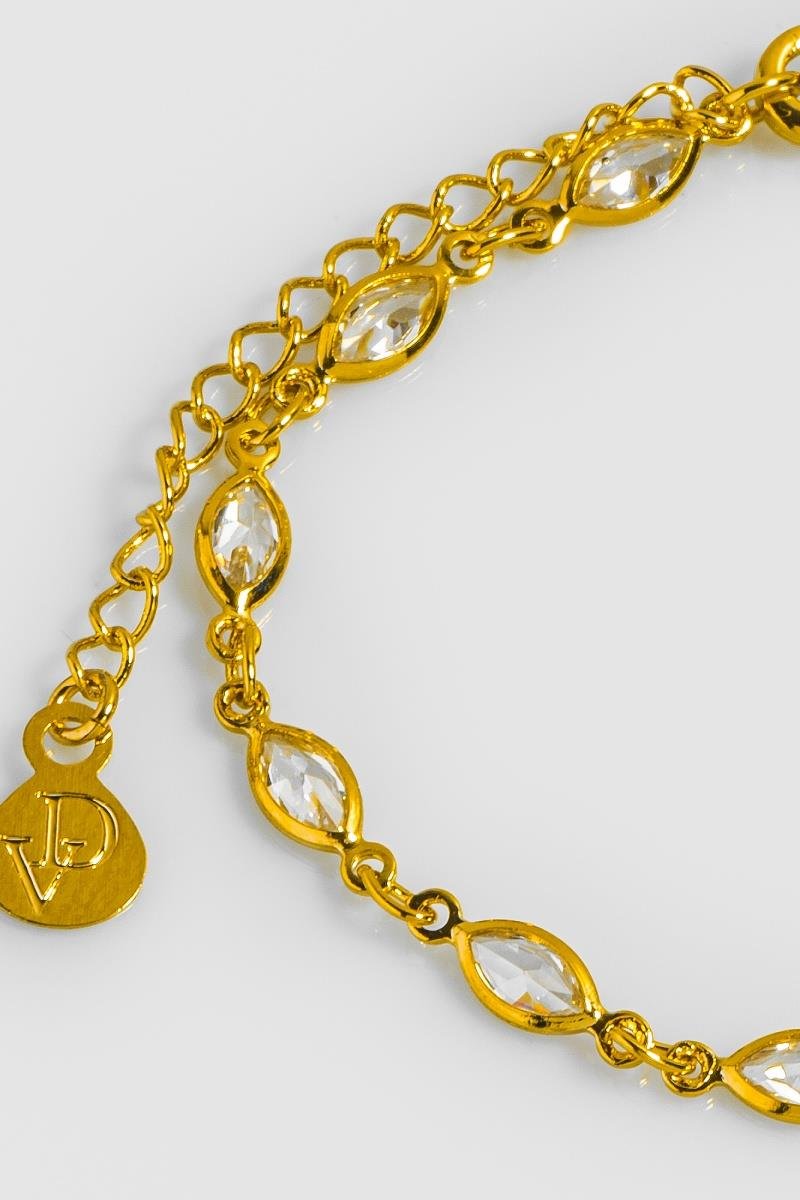 PULSEIRA ZIRCÔNIAS NAVETE OURO