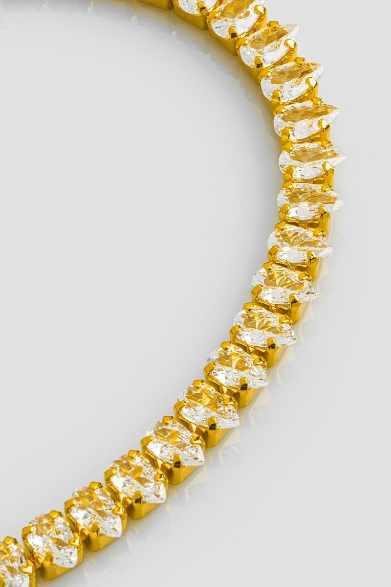 PULSEIRA RIVIERA COM ZIRCÔNIAS EM FORMATO DE GOTA OURO
