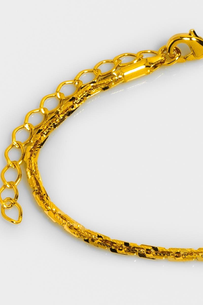 PULSEIRA TORCIDA ELO DUPLO DIAMANTADO OVAL OURO