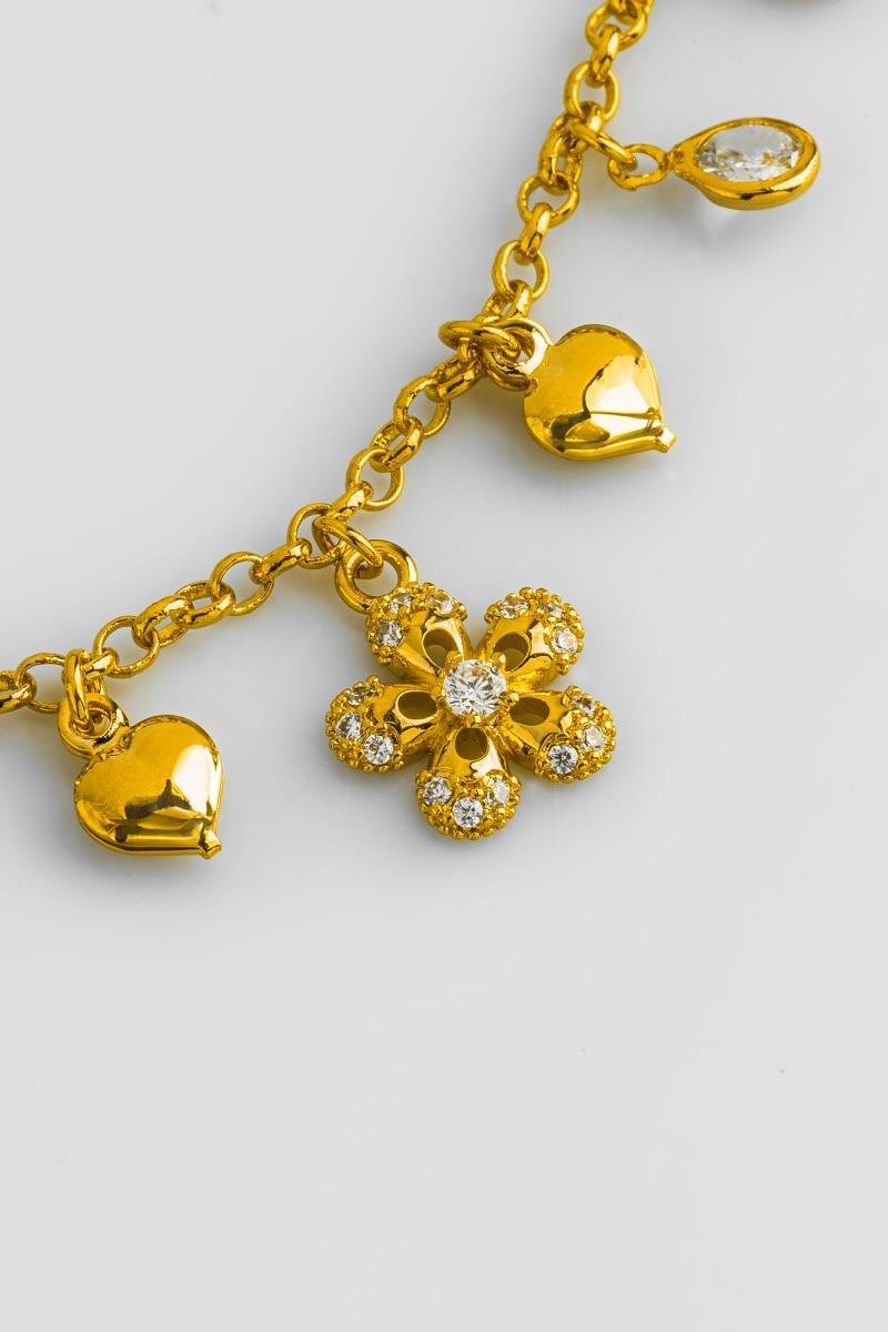 PULSEIRA COM FLOR CRAVEJADA EM ZIRCÔNIAS CORAÇÃO LISO PONTO DE LUZ ELO PORTUGUÊS OURO