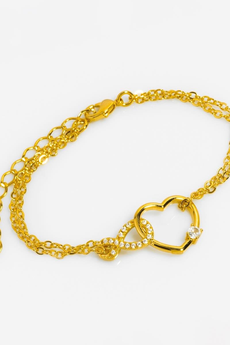 PULSEIRA ELO INFINITO CRAVEJADO EM ZIRCÔNIAS COM CORAÇÃO ENTRELAÇADO OURO