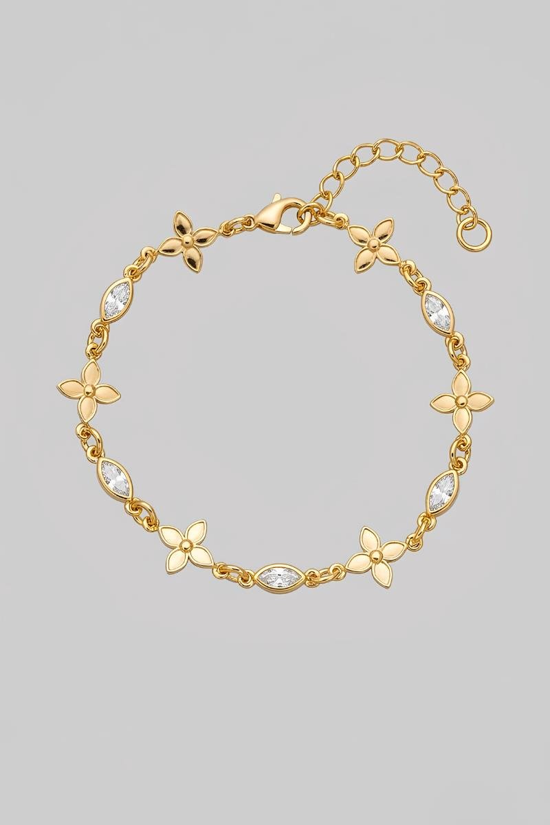 PULSEIRA COM FLOR LISA NAVETE ZIRCÔNIAS OURO