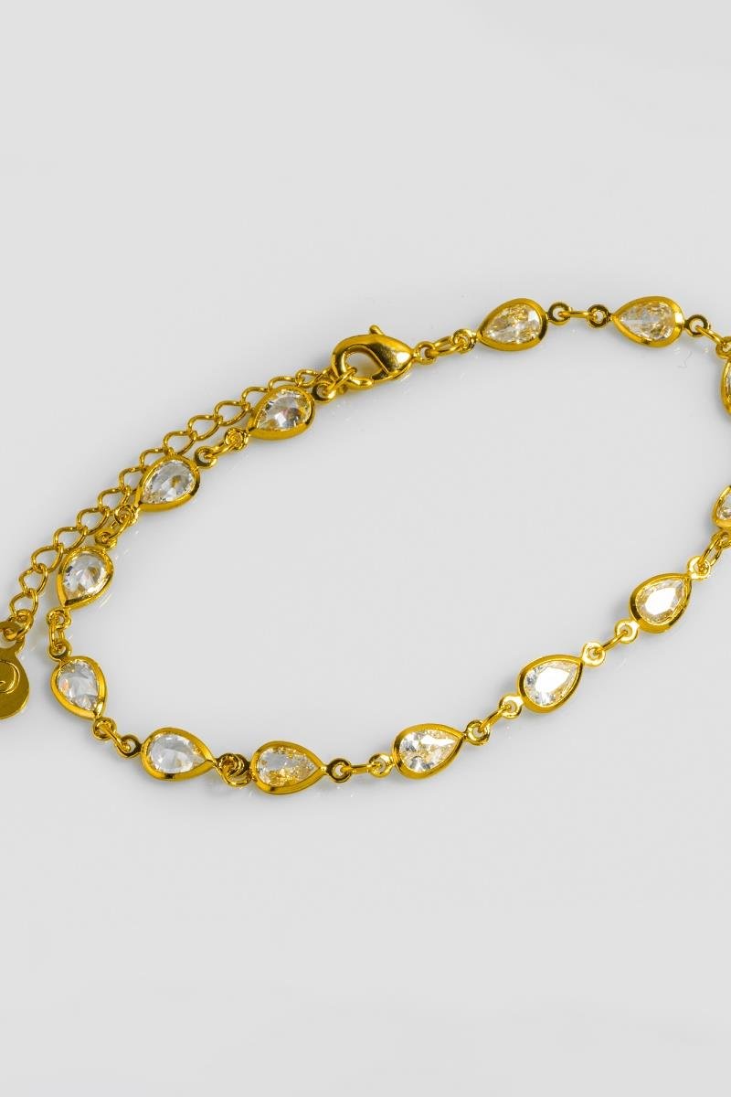 PULSEIRA ZIRCÔNIAS GOTA OURO
