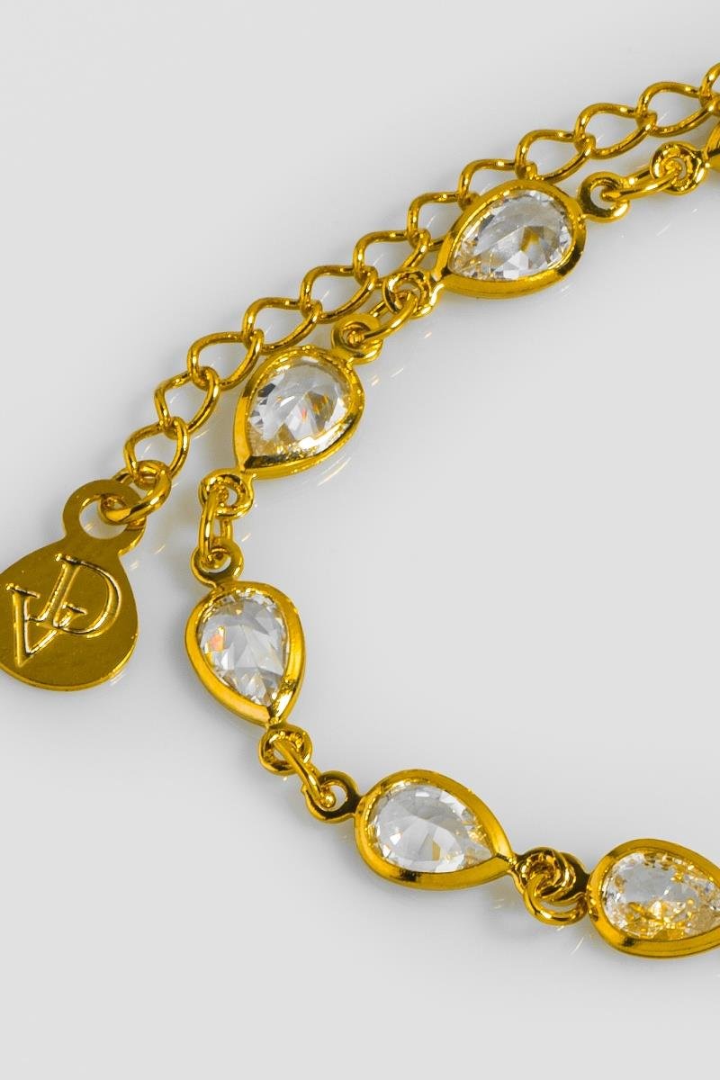 PULSEIRA ZIRCÔNIAS GOTA OURO